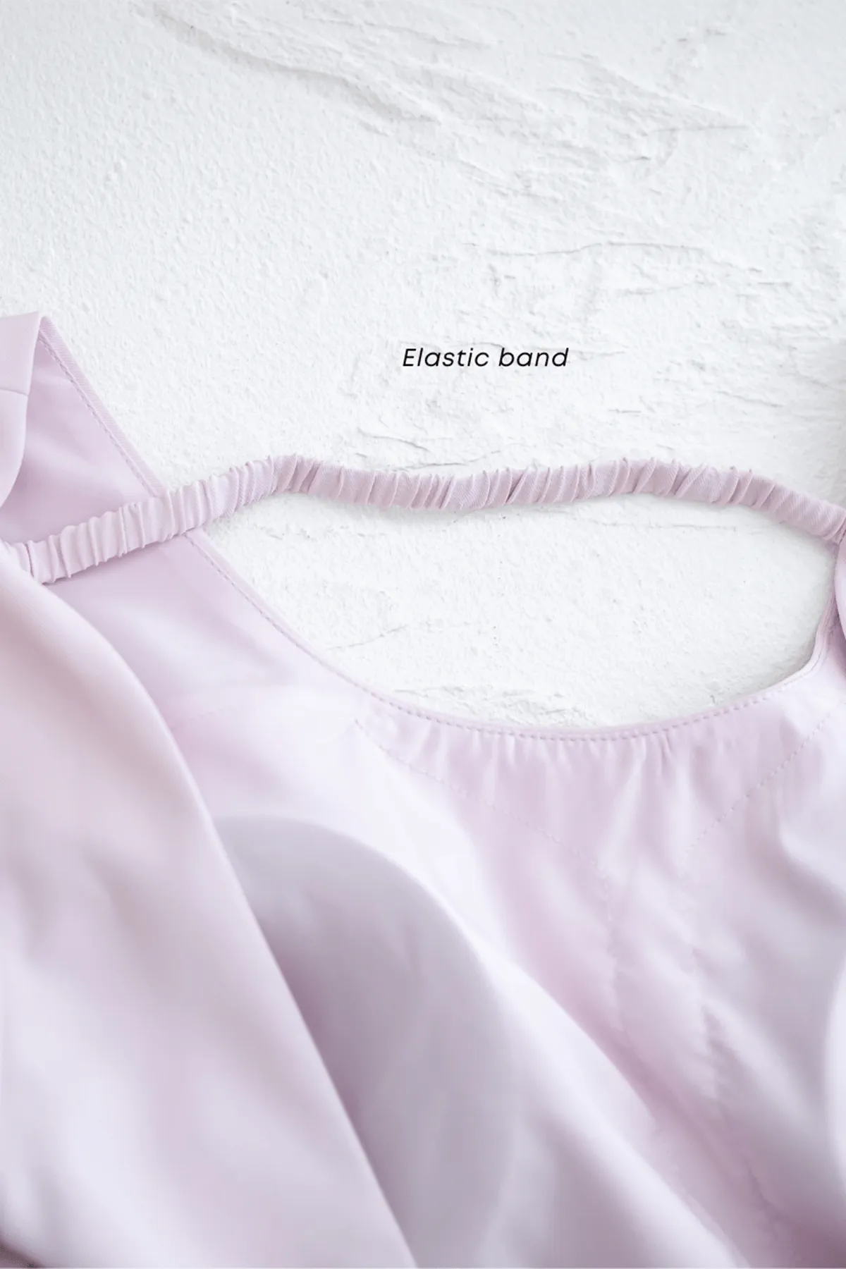 BEBE PADDED BOW OPEN BACK TOP IN OAT