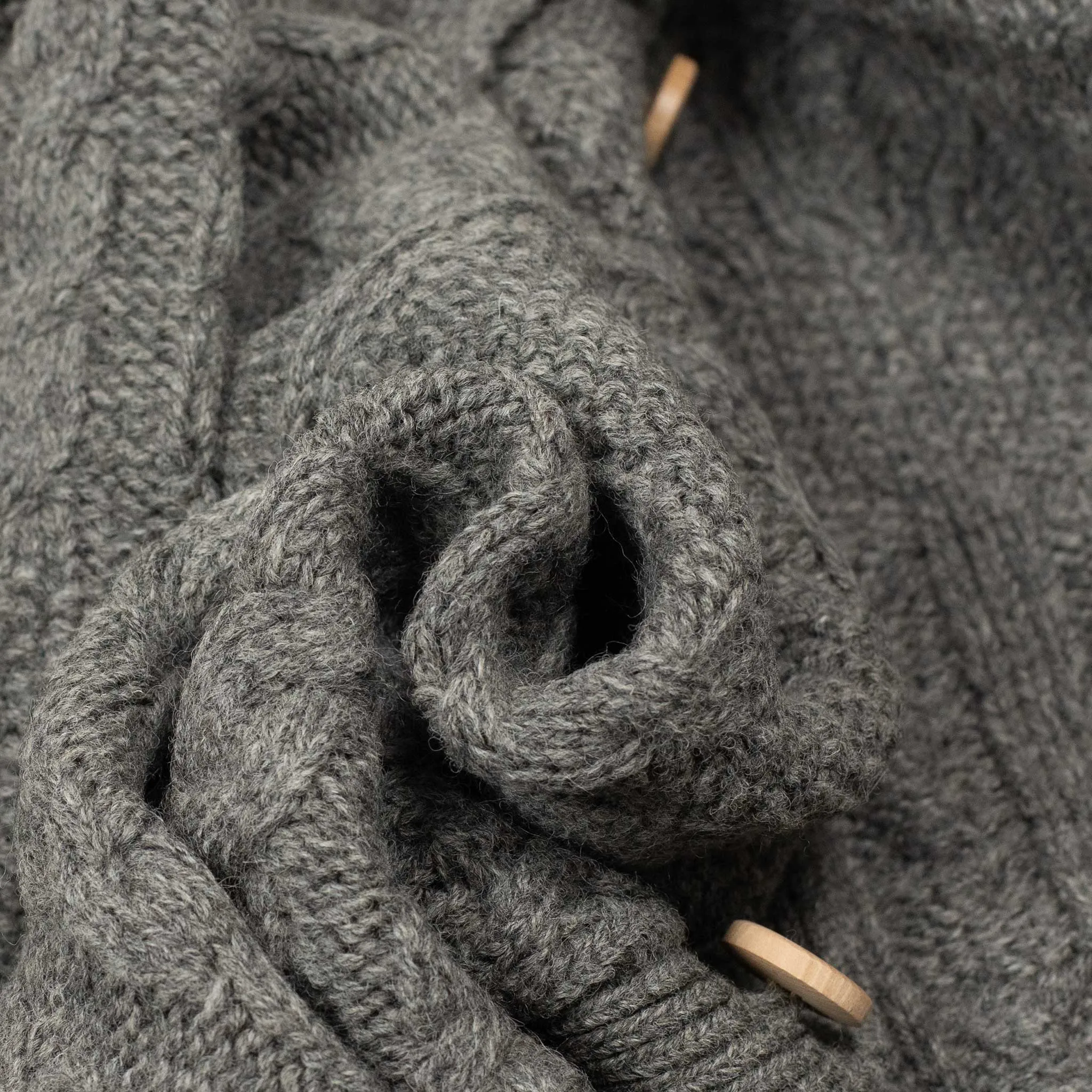 Crazy cable knit Aran cardigan in grey wool